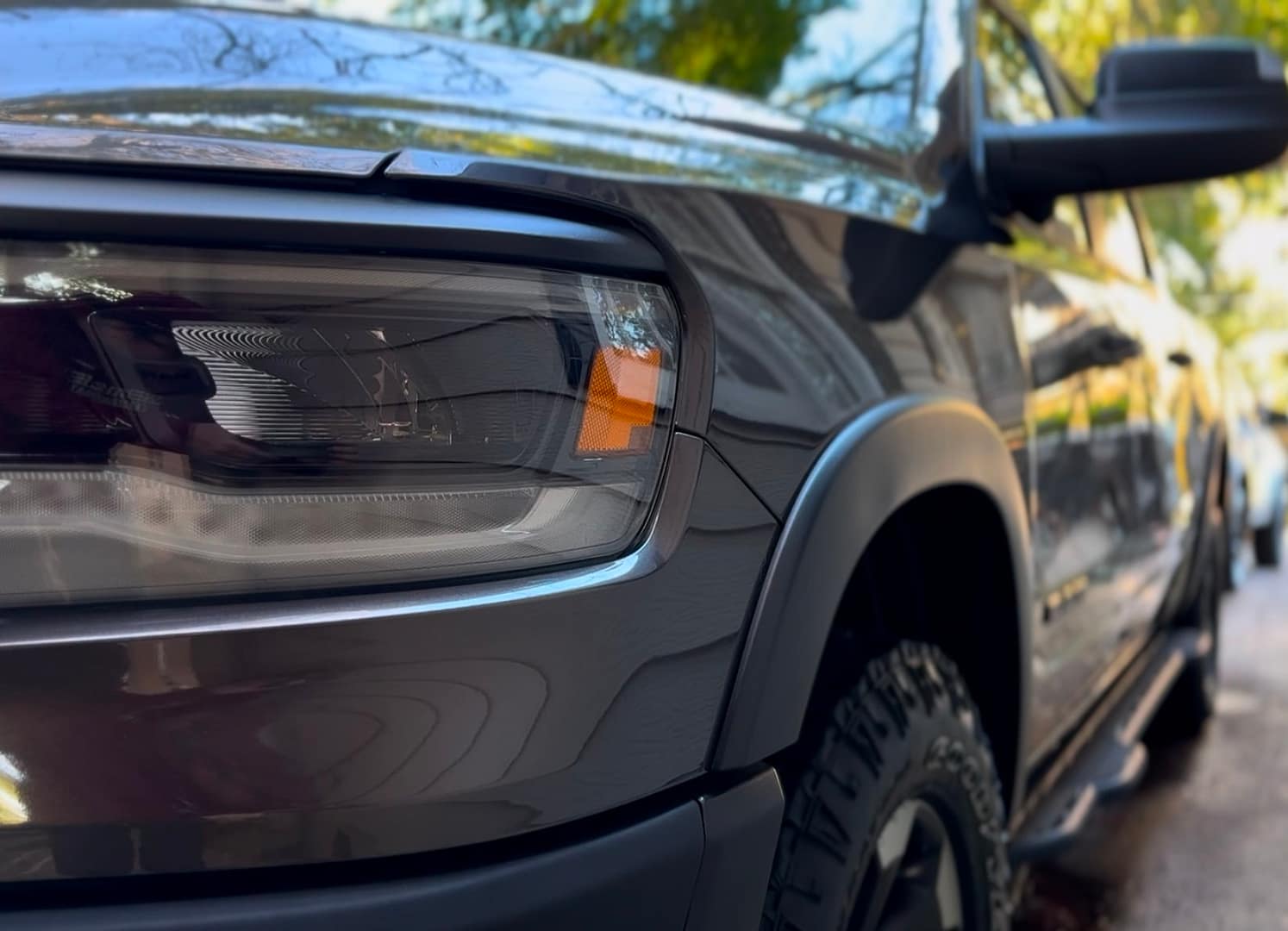 Ceramic coating on the plastic headlight and bumper of a Dodge Ram in Tallahassee, FL.